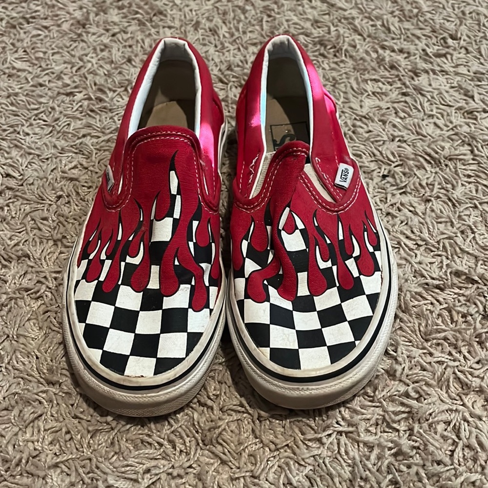 Red drip, black and white checkered slip on vans